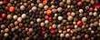 Four color peper or mixes peppercorns top view.