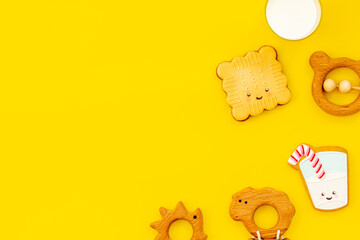 Wall Mural - Homemade funny biscuits for kids with kids toys, top view