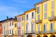 palazzi storici colorati su piazza vittoria di lodi in italia, colorful historical buildings on piazza vittoria in lodi city in italy 