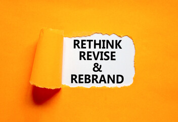 Wall Mural - Rethink revise rebrand symbol. Concept word Rethink Revise and Rebrand on beautiful paper. Beautiful orange paper background. Business brand motivational rethink revise rebrand concept. Copy space