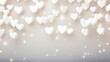 Valentine's day background with white hearts hanging and bokeh lights.