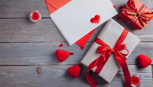 Colorful White Wrapped Presents And Envelopes With Red Bows And Hearts On Wood Background