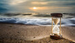 Hourglass with sand. Concept of running time and inevitable passing life. Abstract background wallpaper.