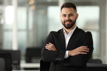 Poster - Portrait of smiling man with crossed arms in office, space for text. Lawyer, businessman, accountant or manager