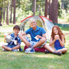 Wall Mural - Camping, children and smile in portrait while outside, bonding and happy for outdoor adventure. Kids, face and eating food together on holiday, friendship and nutrition in nature, relaxing and grass