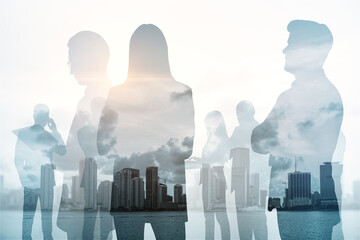 Wall Mural - Creative city skyline with businesspeople silhouettes on light wallpaper. Teamwork, partnership and success concept. Toned image. Double exposure.