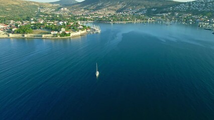 Wall Mural - Aerial shot sail yacht traveling from Foca resort town, Izmir region Turkey