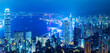 Hong Kong cityscape with victoria harbour and large group of tall buildings at night