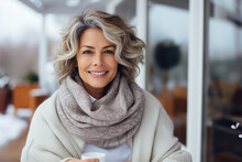 Beautiful Mature Woman Drinking Tea Or Coffee At Terrace In Winter