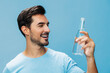 © SHOTPRIME STUDIO - T-shirt man healthy lifestyle studio drink bottle sport smile attractive water