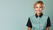 Blonde woman in retail worker uniform smile isolated on pastel background