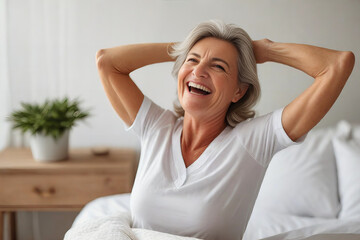 Canvas Print - happy mature woman in the morning in bed at home, good carefree morning