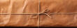 brown paper background, gift ribbon