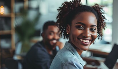 Wall Mural - a beautiful african american business woman with a smile working with black male colleague in office. generative AI