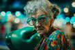 Irish grandmother wearing green boxing gloves, strong and determined, positive and dynamic, showing fists, ready to fight - Active senior lifestyle concept : Sunset of life in colors
