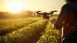 © Valeriia - Aerial agrodrone operated by man for precision agriculture management.