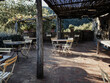 beautiful terrace/outdoors of a small winery in tuscany, italy. Play of shadows and sun with a nice view