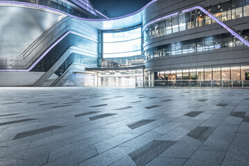 Empty square floor and city glass building landscape