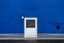 Metal Door On Blue Wall