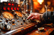 Close-up of a hand adjusting dials on a vintage control panel with gauges, conveying a sense of navigation and operation.