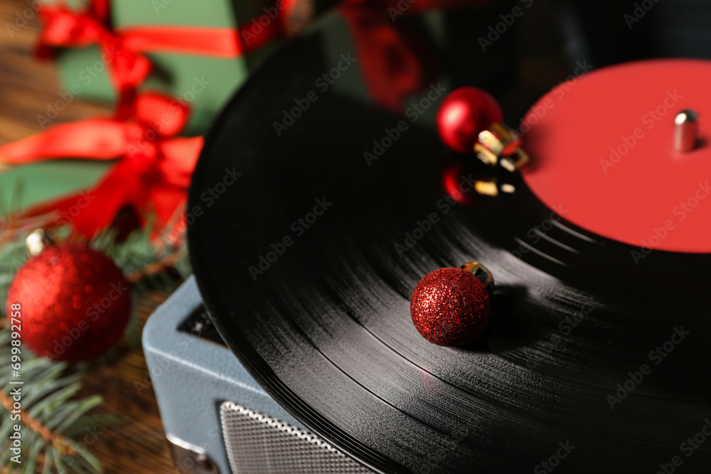 Vinyl record player with Christmas decorations