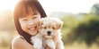 Cute little girl holding puppy 