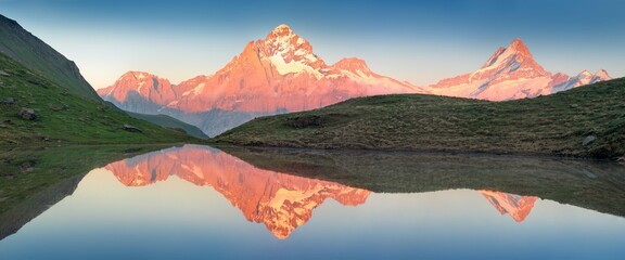 Wall Mural - Panorama of Bachalpsee lake in Swiss Alps mountains. Snowy peaks of Wetterhorn, Mittelhorn and Rosenhorn on background. Grindelwald valley, Switzerland. Landscape photography
Bern canton, Switzerland,