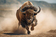 bighorn bull running through dust bokeh style background