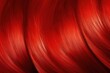 Reddyed hair with healthy texture, smooth close-up backdrop.