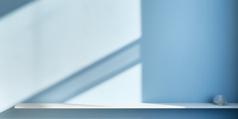 Wall Mural - Minimal abstract light blue background for product presentation. Shadow and light from windows on plaster wall