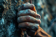 rock climber’s hand gripping a rough hold, close-up, visible sweat and chalk, tension in the veins