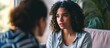 © TheWaterMeloonProjec - Millennial woman consults psychologist for behavior improvement and personal growth.
