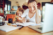 © Geber86 - Stressed Mother Working from Home with Child