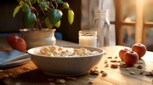 Breakfast With Oatmeal And Milk On A Wooden Table In The Morning Light