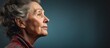 © TheWaterMeloonProjec - Mature woman with a sad expression, side view, blank area.