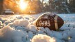 An American football half-buried in snow, symbolizing perseverance and the winter season.