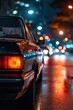 © BrandwayArt - The rear view of a car on the road at night in the city