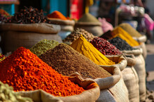 Colorful And Exotic Spice Market In Marrakech In Morocco, A Vibrant And Unique Summer Travel Background, With Bright Spices