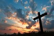 © Lucija - A simple cross standing alone against a backdrop of a dramatic sunset sky, clouds parting as if in reverence to the symbol of faith.
