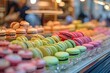 A patisserie window filled with colorful macarons