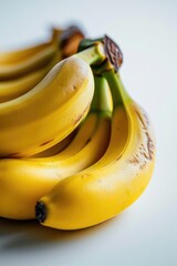 Poster - A pile of bananas stacked on top of each other. This image can be used to depict abundance, healthy eating, tropical fruits, or grocery shopping