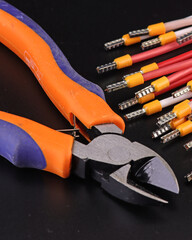 Electrical installation tools for work on the assembly of electrical panels.