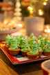 Christmas tree desserts on a warm festive table