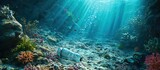 Fototapeta Do akwarium - A very old non biodegradable plastic bottle on the sea floor on a tropical coral reef. Creative Banner. Copyspace image