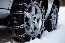 A Tire With Chains On It