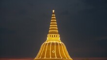 Golden Pagoda Of Phra Pathom Chedi With Sunset Sky In Downtown