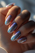 Holographic glitter ombre nails, almond shape, sparkling in sunlight with a soft-focus background.