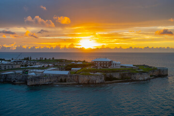 National Museum of Bermuda and rampart with sunset at the background in the former Royal Naval Dockyard in Sandy Parish, Bermuda. 