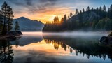 Fototapeta  - Serene Sunrise: Captivating Mountain Lake Reflections in Tranquil Dawn Mist - HDR Landscape Photography