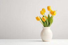 Minimalistic Flower Composition. Yellow Tulip In A Vase On A White Background, Space For A Text